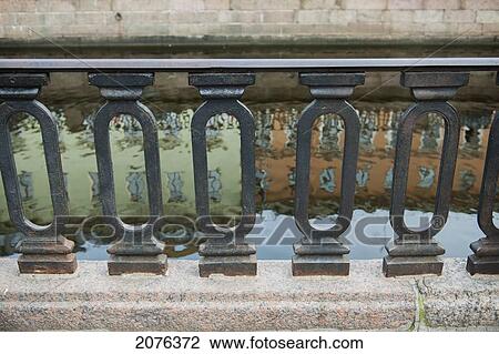 Buildings Reflected Into The Canal As Seen Through A Railing; St. Petersburg Russia View Large Photo Image Stock Image - Buildings Reflected Into The Canal As Seen Through A Railing; St. Petersburg Russia. Fotosearch