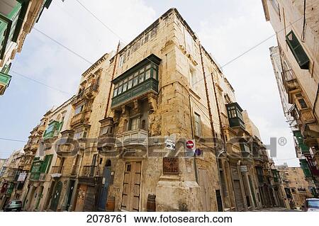Stock Image - Buildings With Enclosed Balconies, Valletta, Malta. Fotosearch