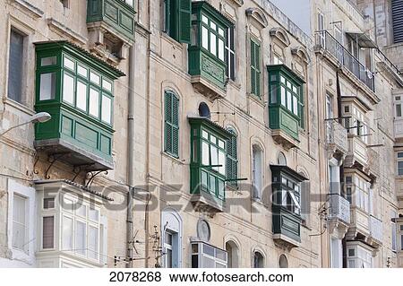 Buildings With Enclosed Balconies, Valletta, Malta View Large Photo Image Stock Photo - Buildings With Enclosed Balconies, Valletta, Malta. Fotosearch
