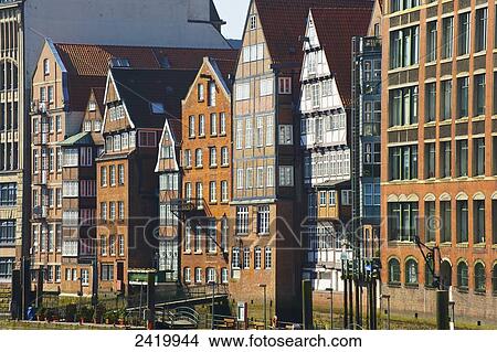 Picture - Buildings with peaked roofs in a row; Hamburg, Germany. Fotosearch
