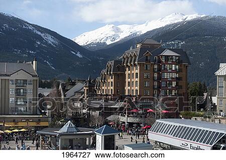 Stock Photo - Buildings With The Coast Mountains In The Background; Whistler British Columbia Canada. Fotosearch