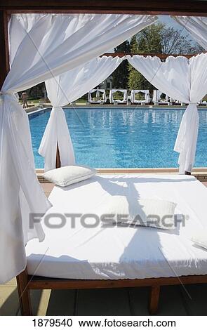 Bulgaria, View Through Canopied Sun Bed Through To Swimming Pool; Varna View Large Photo Image Stock Image - Bulgaria, View Through Canopied Sun Bed Through To Swimming Pool; Varna. Fotosearch