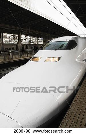 Stock Photo - Bullet Train From The Front In The Train Station; Tokyo, Japan. Fotosearch