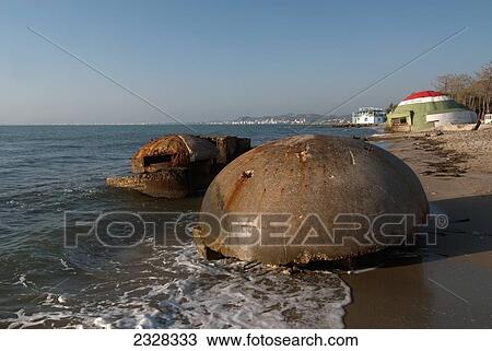 Stock Image - Bunkers on beach near Durres; Albania. Fotosearch