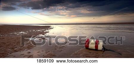Buoy On Seashore; Alnmouth, Northumberland, England View Large Photo Image Stock Photo - Buoy On Seashore; Alnmouth, Northumberland, England. Fotosearch