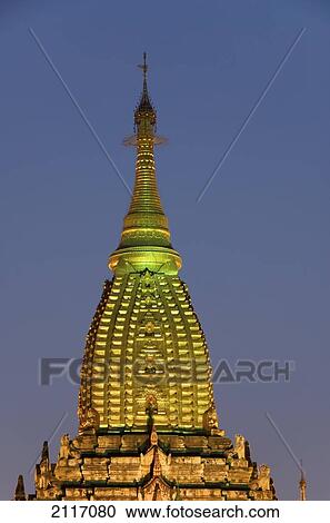 Stock Image - Burma (Myanmar), Bagan, Silhouetted temples at sunset.. Fotosearch