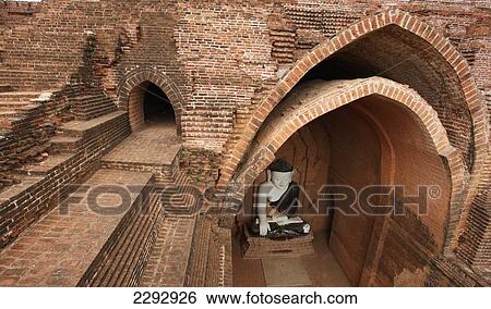 Stock Photograph - Burma/ Myanmar, Buddha statue in Buddhist pagoda; Bagan. Fotosearch