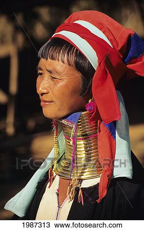 Stock Image - Burma (Myanmar), Kaungdine Village, Inle Lake, Padaung Tribal Woman With Many Neck Rings, View From Side. Editorial Use Only.. Fotosearch