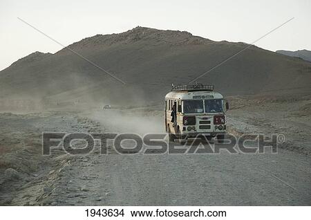Bus Approaching Maidan Shar, Vardak Province, Afghanistan View Large Photo Image Picture - Bus Approaching Maidan Shar, Vardak Province, Afghanistan. Fotosearch