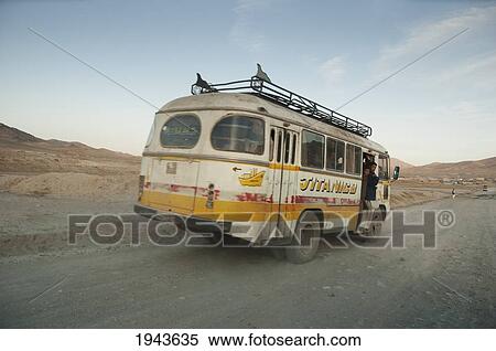 Stock Photography - Bus Approaching Maidan Shar, Vardak Province, Afghanistan. Fotosearch