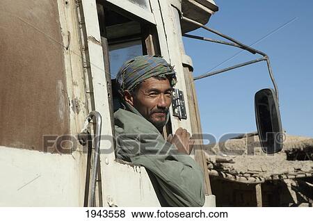 Bus Driver In Chahar Deh-Ye Ghowr Band, Parwan Province, Afghanistan View Large Photo Image Stock Photo - Bus Driver In Chahar Deh-Ye Ghowr Band, Parwan Province, Afghanistan. Fotosearch