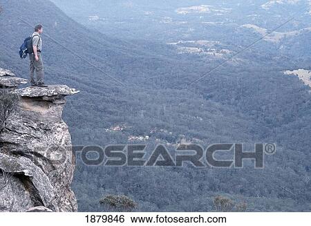 Bushwalker In Southern Highlands On Rock Overlooking Valley; New South Wales, Australia View Large Photo Image Stock Photograph - Bushwalker In Southern Highlands On Rock Overlooking Valley; New South Wales, Australia. Fotosearch