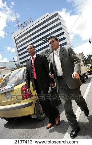 Stock Image - Business men on the 72nd street. Bogota, Colombia.. Fotosearch