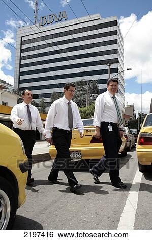 Stock Photograph - Business men on the 72nd street. Bogota, Colombia.. Fotosearch