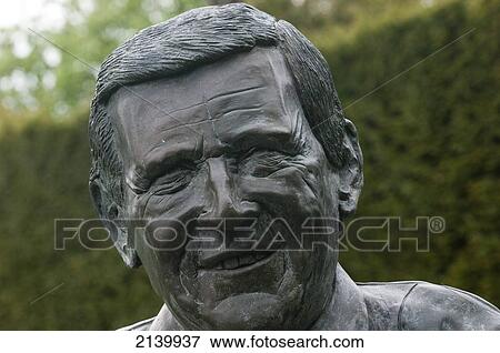 Stock Photo - Bust of televisions 'Gardeners World' gardener and presenter Geoff Hamilton at Barnsdale Gardens; Rutland, England. Fotosearch