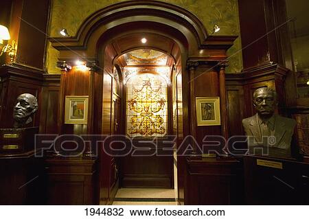 Stock Image - Busts and stained glass window in Cafe Tortoni, Buenos Aires, Capital Federal, Argentina. Fotosearch