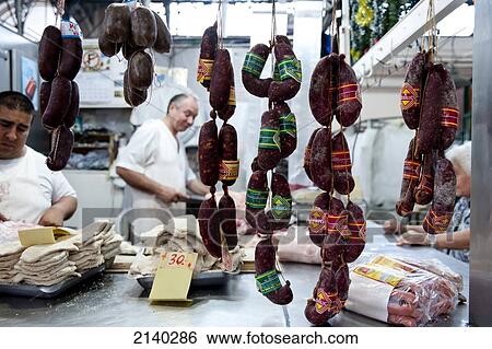 Stock Photograph - Butcher In Mercado De San Telmo, San Telmo, Buenos Aires, Argentina. Fotosearch
