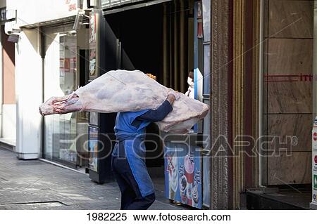 Butcher Taking In Raw Meat To Restaurant Near Taksim Square; Istanbul Turkey View Large Photo Image Stock Photography - Butcher Taking In Raw Meat To Restaurant Near Taksim Square; Istanbul Turkey. Fotosearch