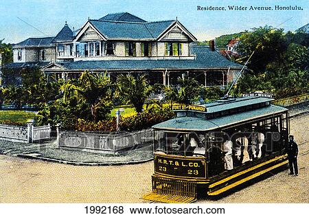 Stock Photo - C. 1905 Postcard, Hawaii, Oahu, Honolulu, Trolley Car Driving Through Residential Neighborhood, Wilder Avenue. Fotosearch