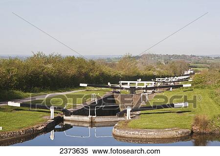 Stock Photography - Caen Hill Locks on Kennet and Avon Canal; Wiltshire, England. Fotosearch