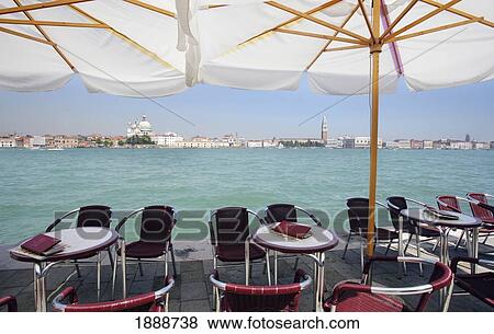 Stock Photo - Cafe Along The Waterfront In Venice. Fotosearch