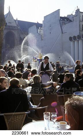 Stock Image - Cafe And Fountains In Place Igor Stravinsky, Paris, France.. Fotosearch