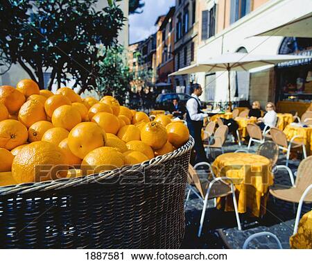 Stock Image - Cafe With Oranges In Piazza Santa Maria. Fotosearch