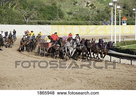 Calgary, Alberta, Canada; Chuckwagon Races At The Calgary Stampede View Large Photo Image Stock Photo - Calgary, Alberta, Canada; Chuckwagon Races At The Calgary Stampede. Fotosearch