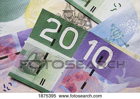 Calgary, Alberta, Canada; Close Up Of Canadian Money View Large Photo Image Stock Photography - Calgary, Alberta, Canada; Close Up Of Canadian Money. Fotosearch