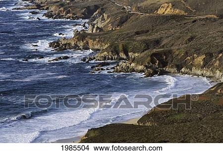 California, Big Sur Coast, Ocean Surf On Shoreline, Highway In Background. View Large Photo Image Picture - California, Big Sur Coast, Ocean Surf On Shoreline, Highway In Background.. Fotosearch