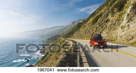 California, Big Sur, Coastal Shot Of Highway 1 With Red Vehicle Driving View Large Photo Image Stock Image - California, Big Sur, Coastal Shot Of Highway 1 With Red Vehicle Driving. Fotosearch
