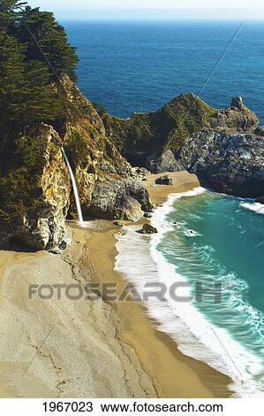 Stock Image - California, Big Sur, Julia Pfeiffer Burns State Park, Waterfall Onto Beach. Fotosearch