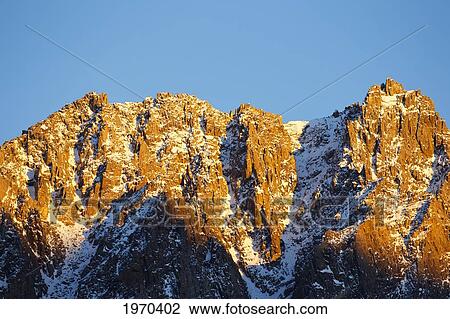 California, Eastern Sierras, Beautiful Snow Capped Mountains At Sunrise. View Large Photo Image Stock Image - California, Eastern Sierras, Beautiful Snow Capped Mountains At Sunrise.. Fotosearch