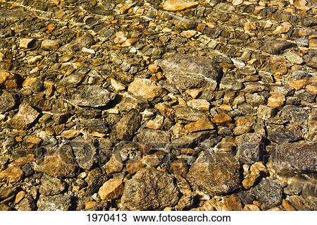 Stock Image - California, Eastern Sierras, Crystal Clear Water In A Mountain Lake. Fotosearch