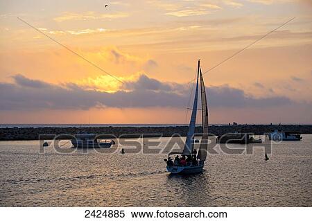 Stock Photography - California, King Harbor, Sailboats at sunset in Redondo Beach.. Fotosearch