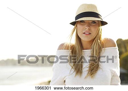 Stock Image - California, Malibu, Outdoor Portrait Of Beautiful Blond Woman.. Fotosearch