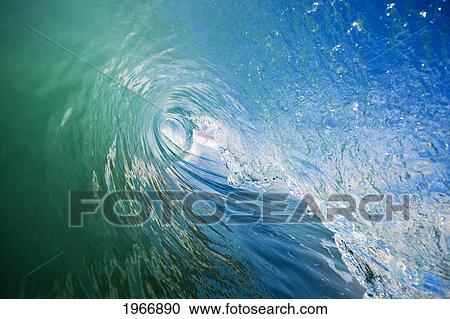 Stock Image - California, Malibu, Zuma Beach, Inside A Wave Barrel. Fotosearch