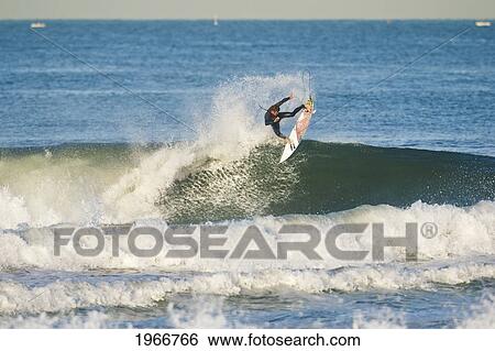 California, Manhattan Beach, Surfer Carving A Big Powerful Turn View Large Photo Image Stock Photograph - California, Manhattan Beach, Surfer Carving A Big Powerful Turn. Fotosearch