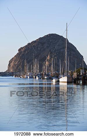 California, Morro Bay, Sailboats Docked In Harbor, Morro Rock In Distance. View Large Photo Image Stock Photo - California, Morro Bay, Sailboats Docked In Harbor, Morro Rock In Distance.. Fotosearch