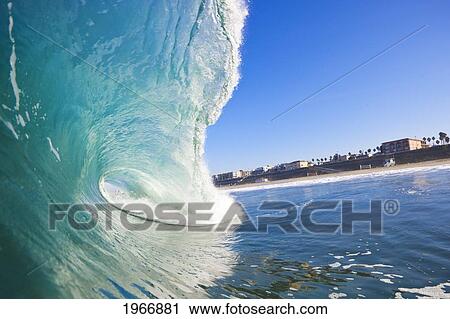 Stock Image - California, Redondo Beach, Large Ocean Wave, View Into The Barrel. Fotosearch