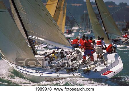 Stock Photo - California, San Francisco, Big Boat Series, Action View Of Crew From Rear Angle, Upwind Tactics, Close-Up. Fotosearch