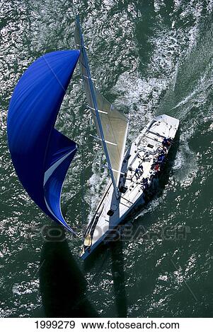 Stock Photo - California, San Francisco, Big Boat Race, Aerial View Of Yacht, Blue Spinnaker. Fotosearch
