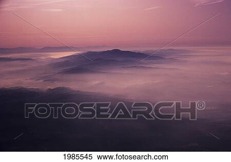 Stock Photography - California, Southern Hills, Sunrise Over Foggy Landscape.. Fotosearch