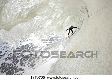 California, Ventura, Surfer In The Barrel On Foamy Ocean Wave. For Editorial Use Only. View Large Photo Image Stock Photography - California, Ventura, Surfer In The Barrel On Foamy Ocean Wave. For Editorial Use Only.. Fotosearch