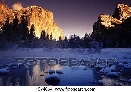 California, Yosemite National Park, Yosemite Valley, Sunset Over El Capitan And Snowy Merced River. View Large Photo Image Picture - California, Yosemite National Park, Yosemite Valley, Sunset Over El Capitan And Snowy Merced River.. Fotosearch