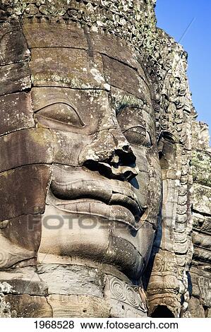 Cambodia, Angkor, Angkor Thom, Large Stone Face In The Bayon. View Large Photo Image Stock Photo - Cambodia, Angkor, Angkor Thom, Large Stone Face In The Bayon.. Fotosearch