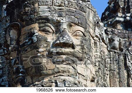 Cambodia, Angkor, Angkor Thom, Large Stone Face Adorns Ancient Gateway. View Large Photo Image Stock Photograph - Cambodia, Angkor, Angkor Thom, Large Stone Face Adorns Ancient Gateway.. Fotosearch
