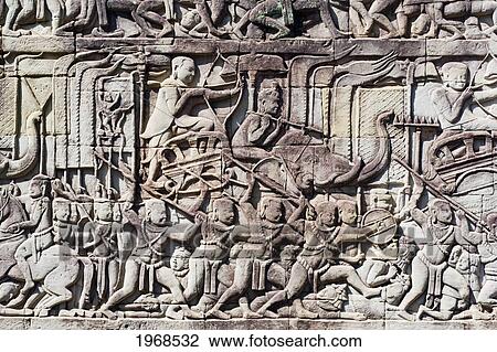 Cambodia, Angkor, Angkor Thom, Intricate Bas-Reliefs In The Bayon. View Large Photo Image Stock Image - Cambodia, Angkor, Angkor Thom, Intricate Bas-Reliefs In The Bayon.. Fotosearch