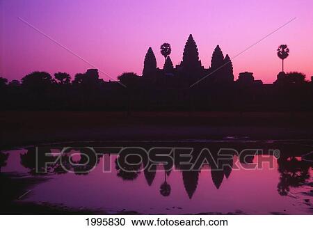 Stock Image - Cambodia, Angkor Wat, Silhouette Of Temple At Sunrise.. Fotosearch