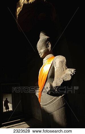 Cambodia, Buddha statue and monk; Angkor Wat View Large Photo Image Stock Photo - Cambodia, Buddha statue and monk; Angkor Wat. Fotosearch